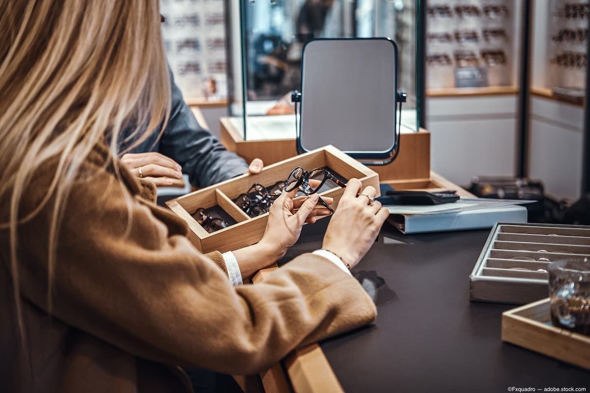 Woman at table in optical room shopping for glassesImage Credit: AdobeStock/Fxquadro