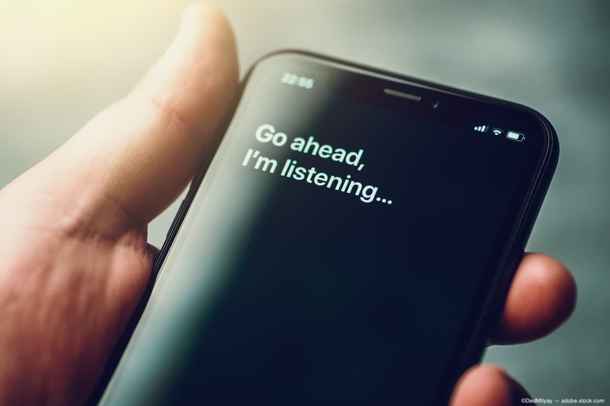 Phone screen with text reading "Go ahead, I'm listening..." Image Credit: AdobeStock/DedMityay 