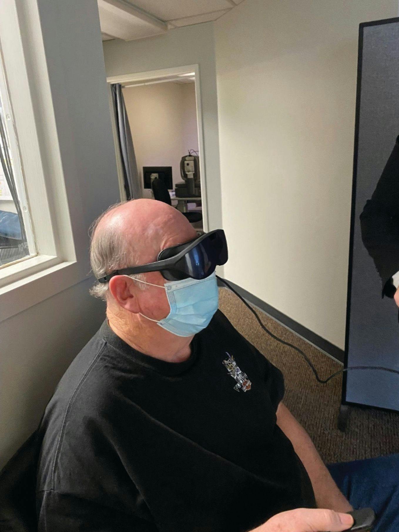 Figure 2 of 3.Two of my North Bay Eye Associates patients taking the Radius XR visual field test (left, in a dilating area; right, in the waiting room).