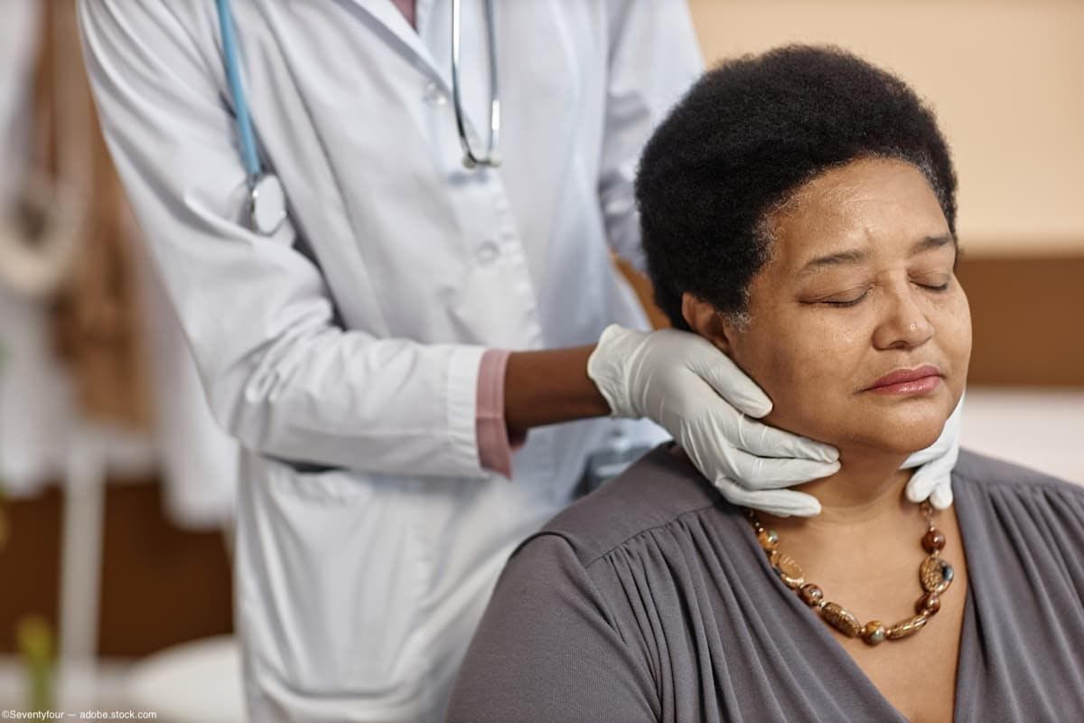Physician examining patient's thyroid glands Image Credit: AdobeStock/Seventyfour