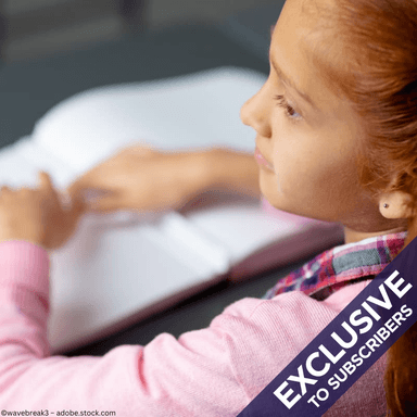 Girl with visual impairments reading Braille Image credit: AdobeStock/wavebreak3