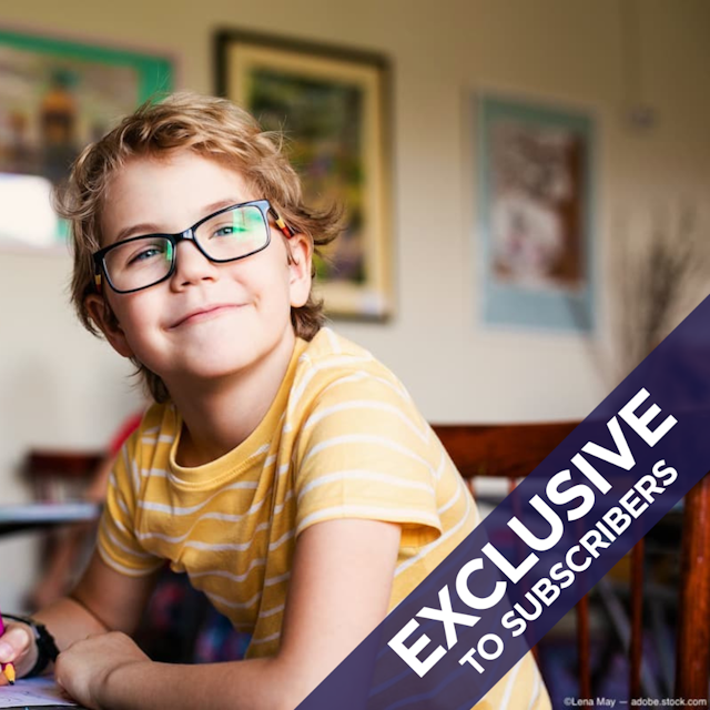 Child wearing glasses at school desk Image credit: ©Lena May - adobe.stock.com