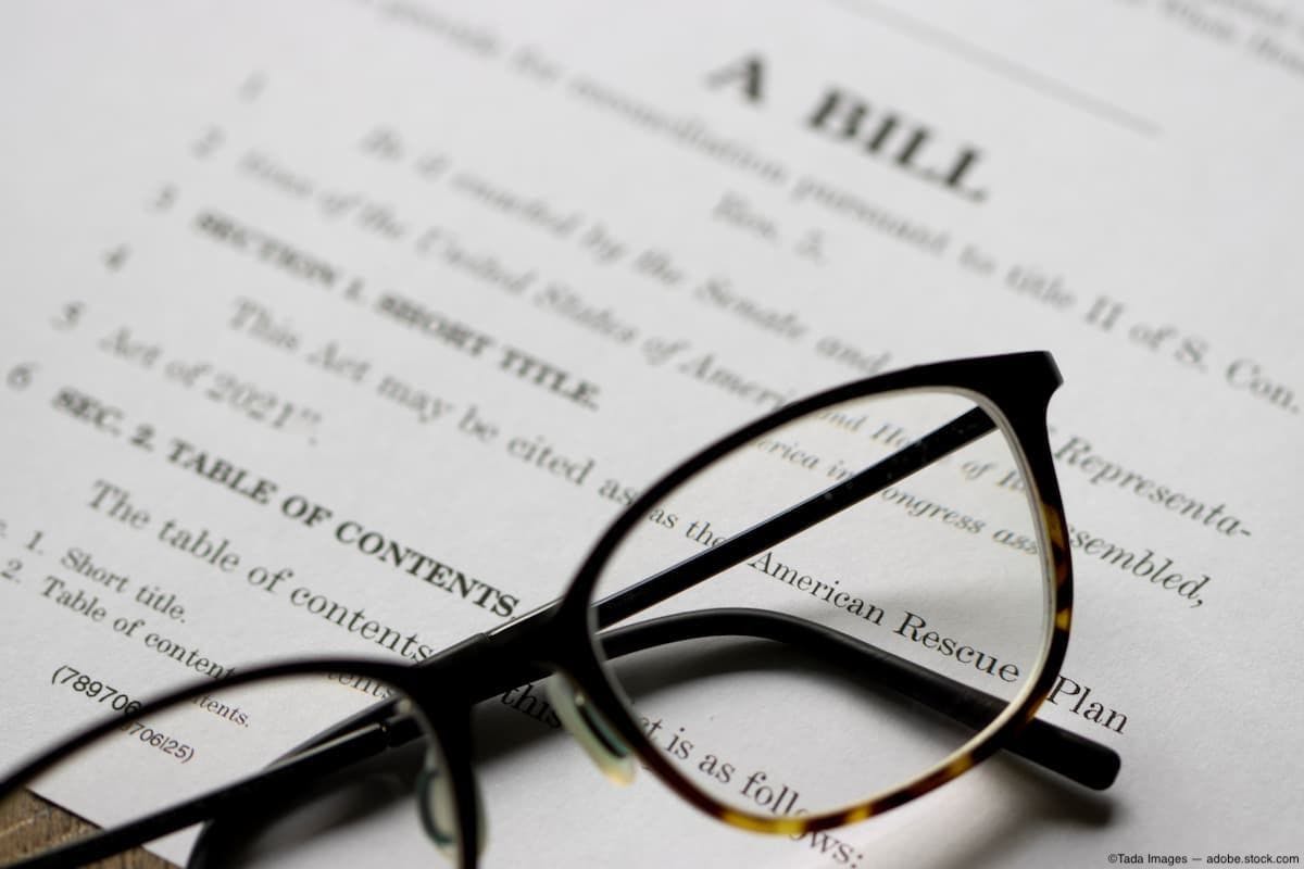Legislative bill with eyeglasses Image Credit: AdobeStock/TadaImages