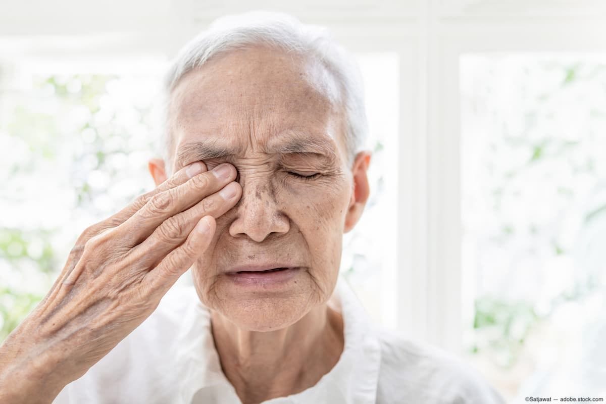 Older person holding eye Image Credit: AdobeStock/Satjawat