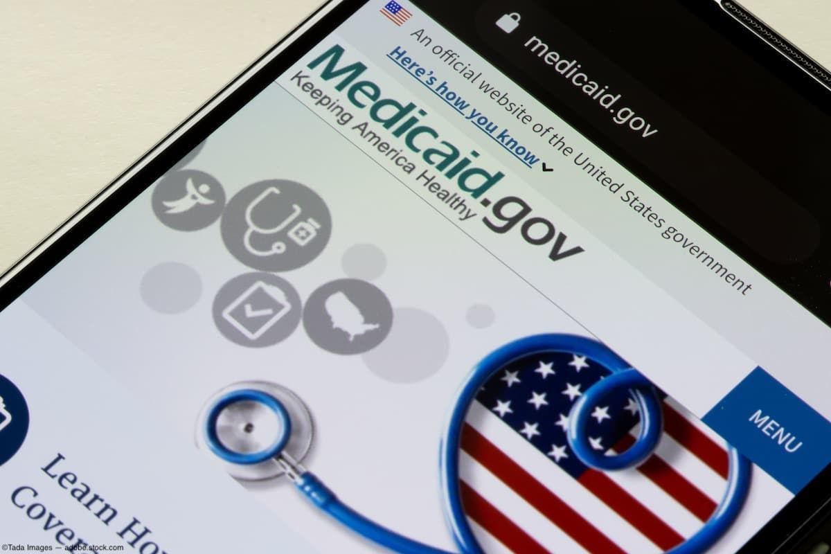 Medicaid homepage on smart phone screen Image credit: AdobeStock/TadaImages