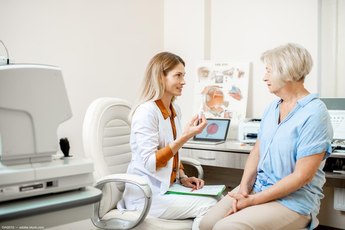 Eye care provider speaking with patient in office Image credit: ©rh2010 - adobe.stock.com