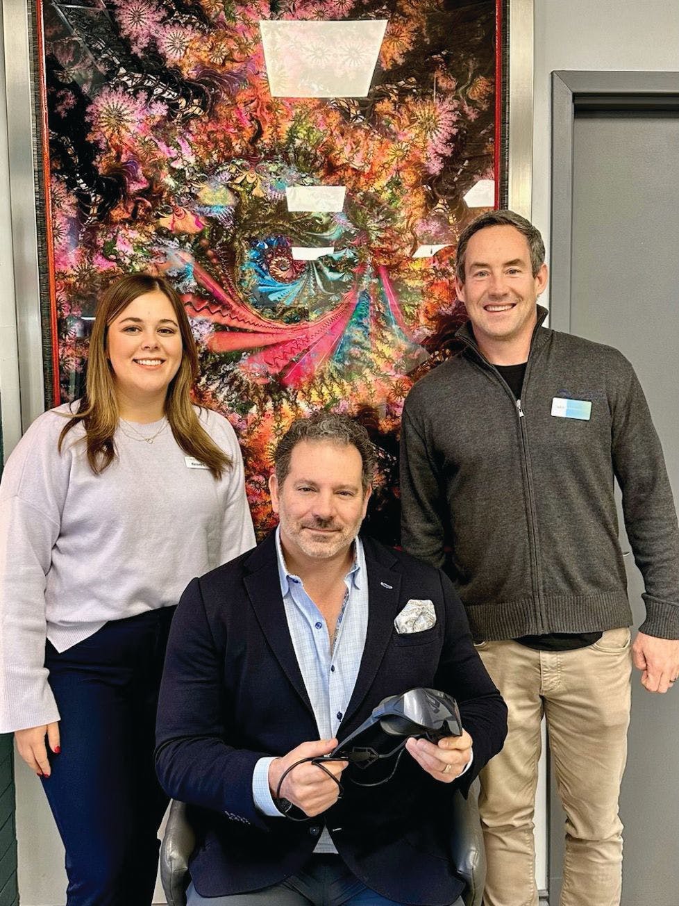 Steve R. Sarkisian Jr, MD (center), and Kelsey O’Neil, diagnostics regional business manager, South, at Glaukos Corporation, after a successful implementation visit with Brian Murphey, global vice president of sales, Radius XR.