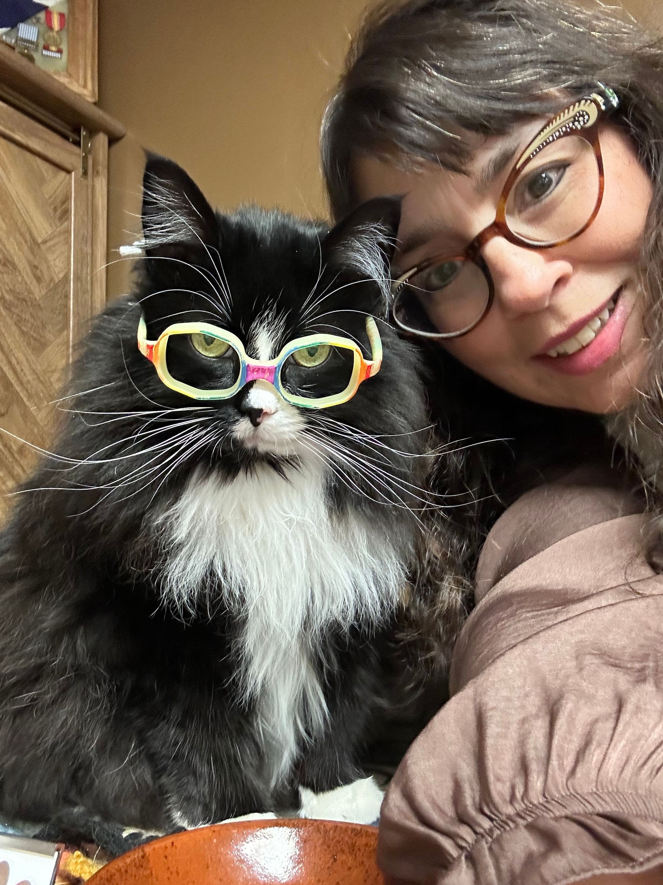 Danielle Crull, ABOM, with Truffles, both outfitted with glasses. Image courtesy of A Child's Eyes.