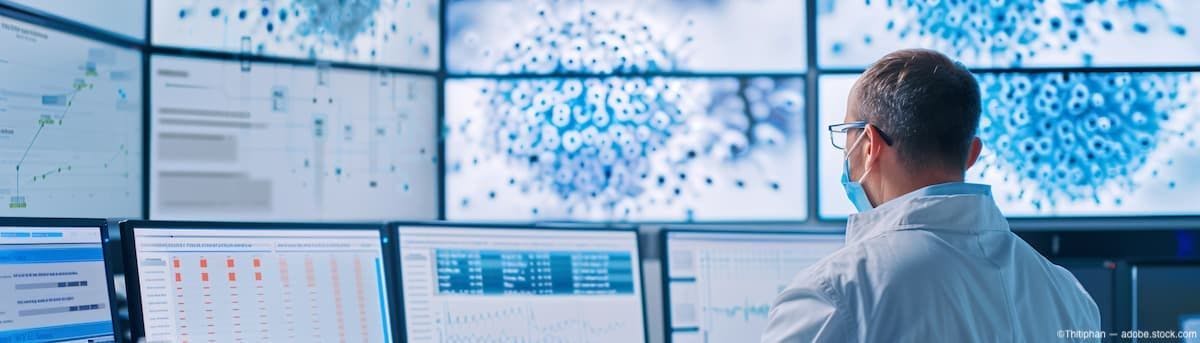 Scientist studying trial results on several computer screens Image Credit: AdobeStock/Thitiphan/AI