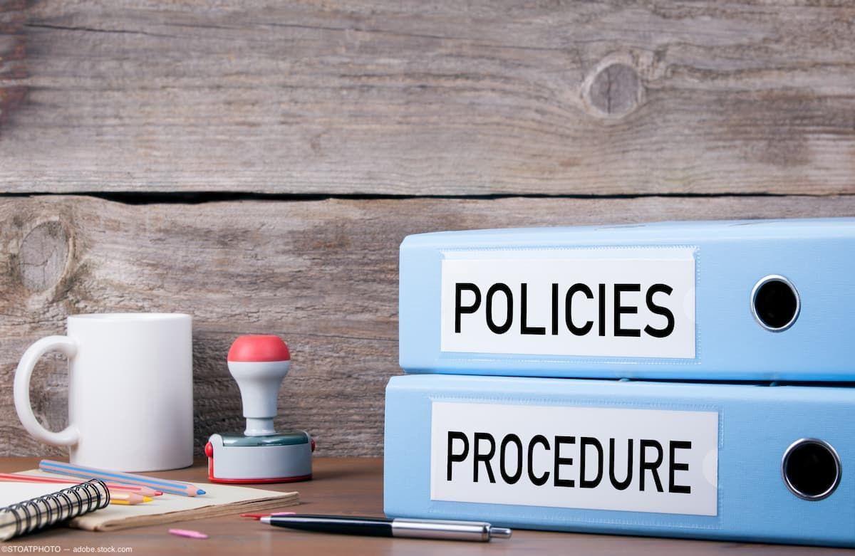 Policy and procedure binders on desk Image credit: AdobeStock/STOATPHOTO