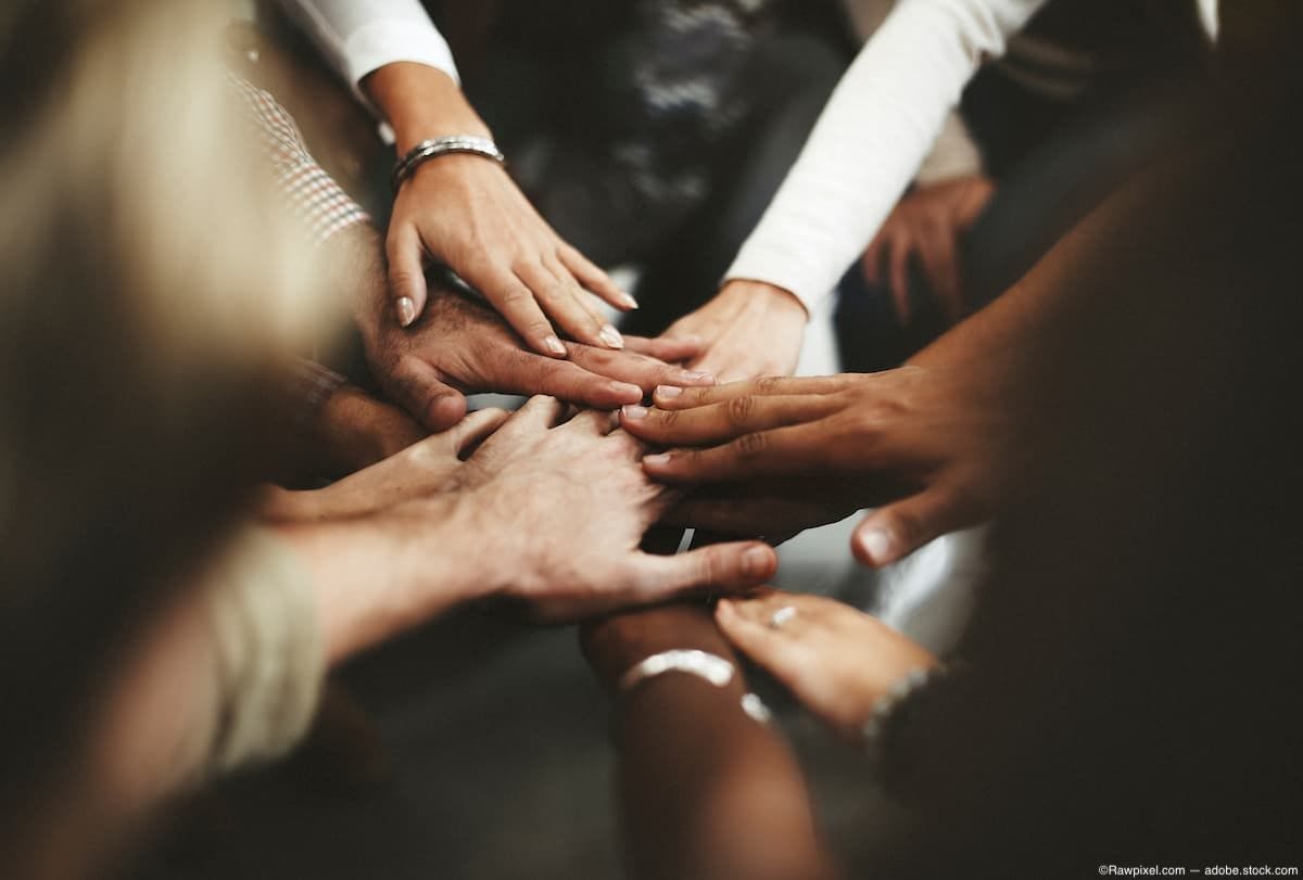 Hands in the middle of a huddle Image credit: ©Rawpixel.com - adobe.stock.com